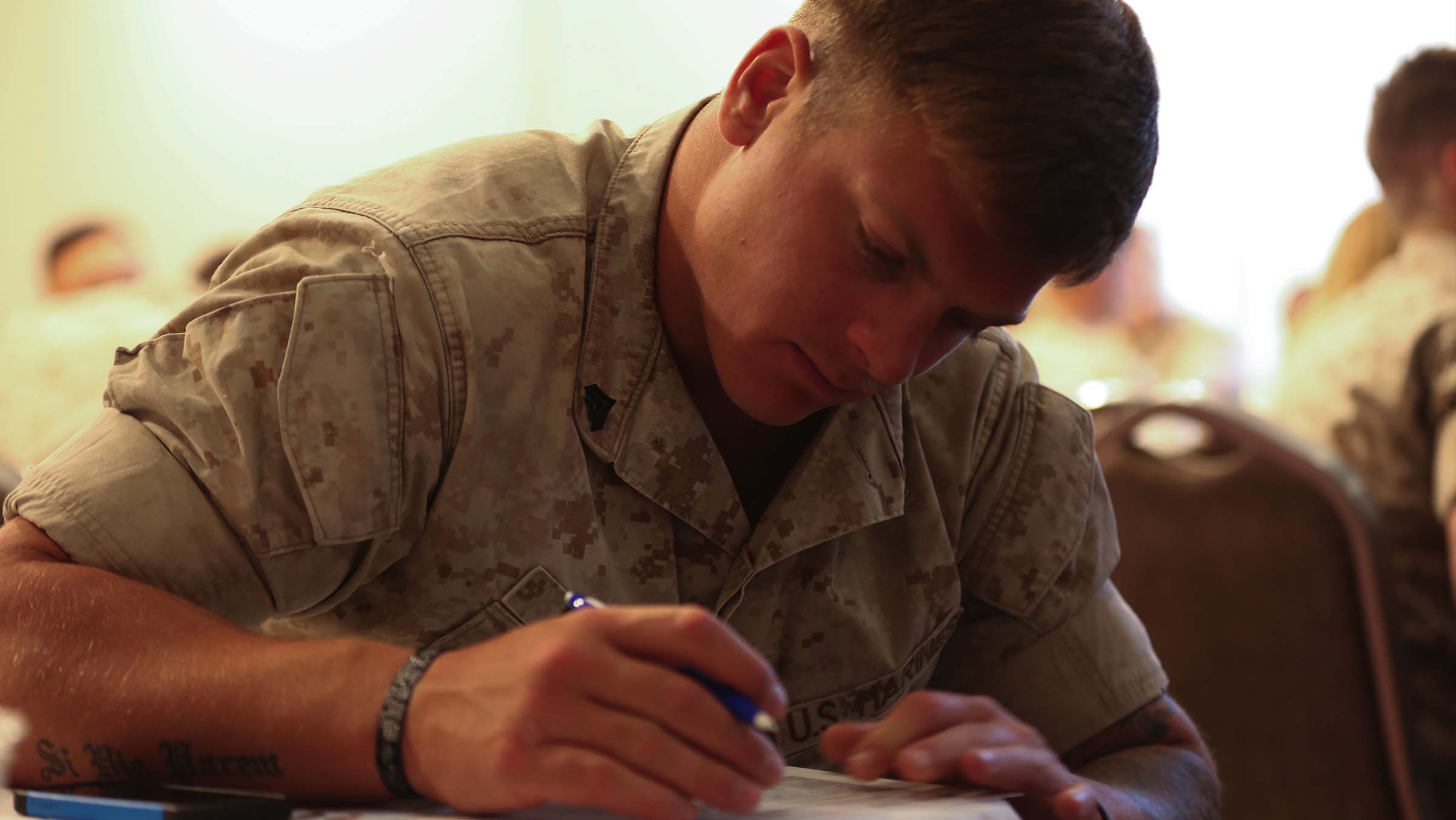 ONE service member fills out résumé information during an employment additionally education plant.